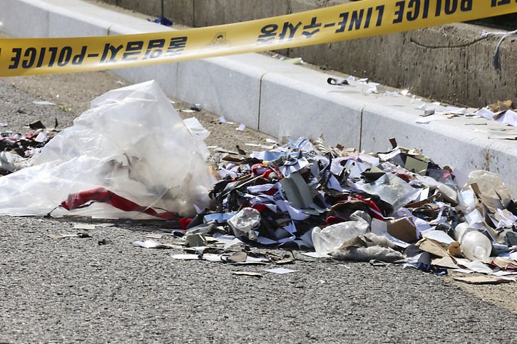 Les ballons nord-coréens sont remplis de déchets, allant des mégots de cigarettes à du plastique. © KEYSTONE/AP